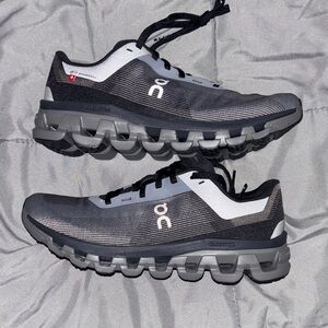 On Running Charcoal and Light Gray Athletic Shoes cloudflow 4